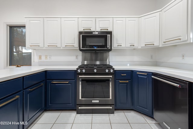 kitchen with gas range, light tile patterned flooring, black dishwasher, and blue cabinets