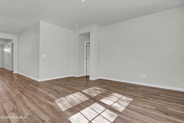 spare room with light hardwood / wood-style floors