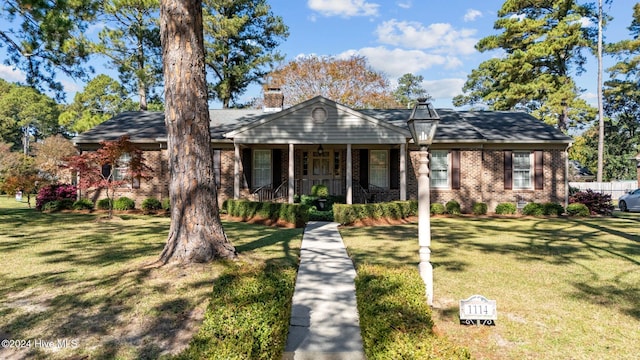 view of front of home featuring a porch and a front yard