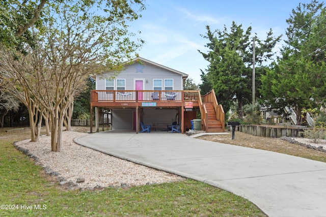 view of front facade featuring a wooden deck