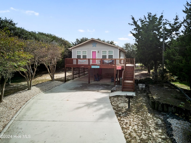 view of front of house with a deck