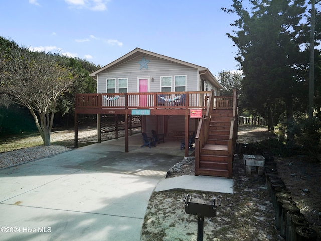 view of front of home with a wooden deck