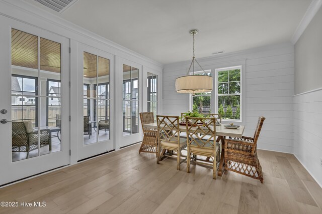 612 Waterstone Dr, Wilmington, NC 28411 - dining room with wood finished floors and ornamental molding