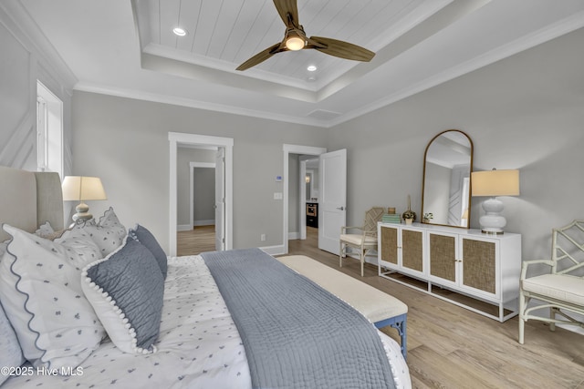 612 Waterstone Dr, Wilmington, NC 28411 - bedroom with a tray ceiling, wood finished floors, crown molding, and recessed lighting