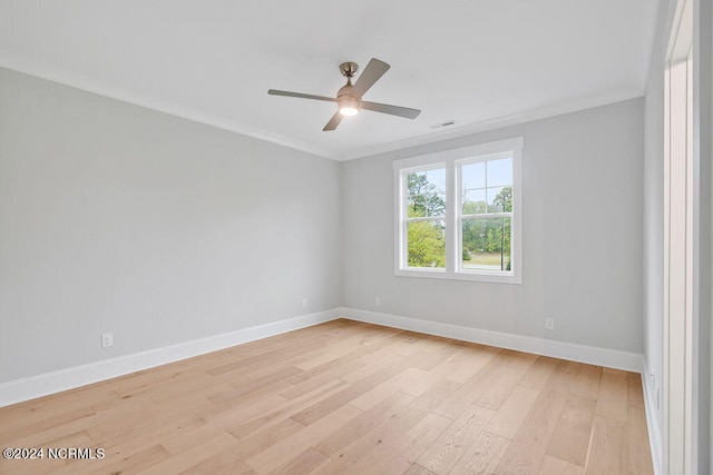 unfurnished room with light hardwood / wood-style floors, crown molding, and ceiling fan