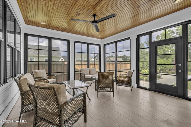 612 Waterstone Dr, Wilmington, NC 28411 - sunroom featuring a ceiling fan and outdoor lounge area