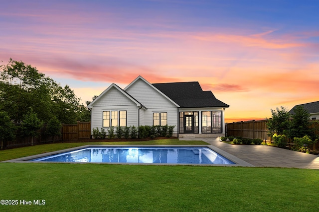 612 Waterstone Dr, Wilmington, NC 28411 - back of property featuring a fenced backyard and a patio area