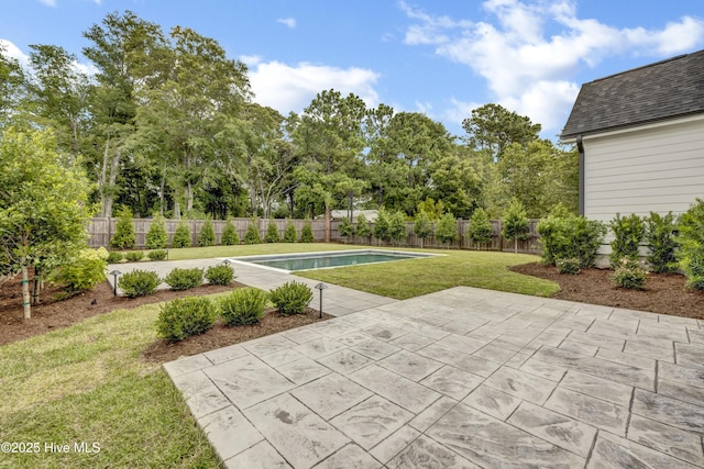 612 Waterstone Dr, Wilmington, NC 28411 - fenced backyard featuring a patio area and view of wooded area