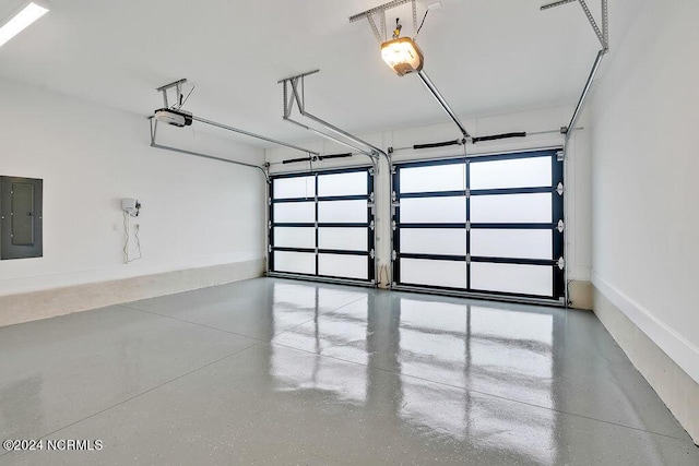 612 Waterstone Dr, Wilmington, NC 28411 - garage featuring electric panel and a garage door opener