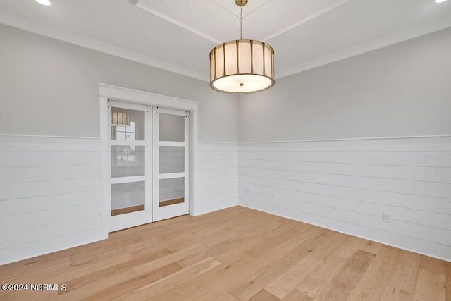 unfurnished room with wood-type flooring