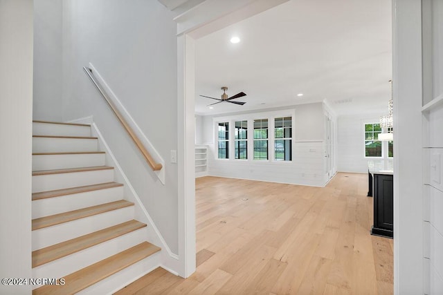 612 Waterstone Dr, Wilmington, NC 28411 - stairs with wood finished floors, a ceiling fan, recessed lighting, and a chandelier