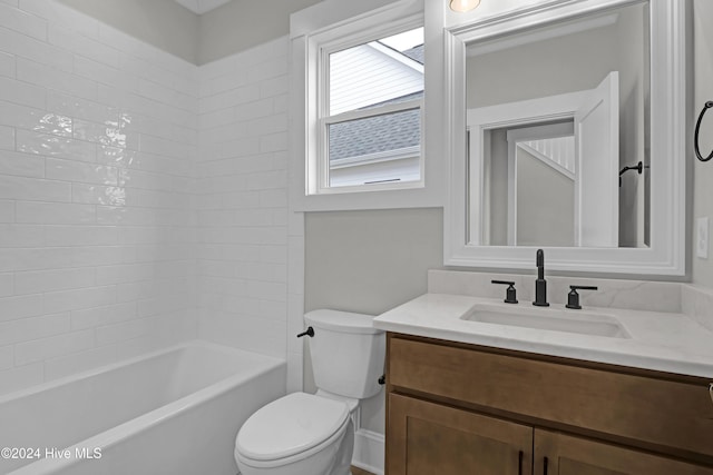 full bathroom with vanity, shower / bath combination, and toilet