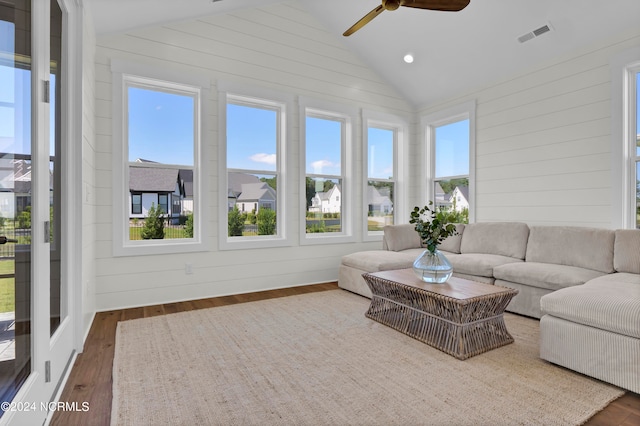 sunroom with vaulted ceiling and ceiling fan