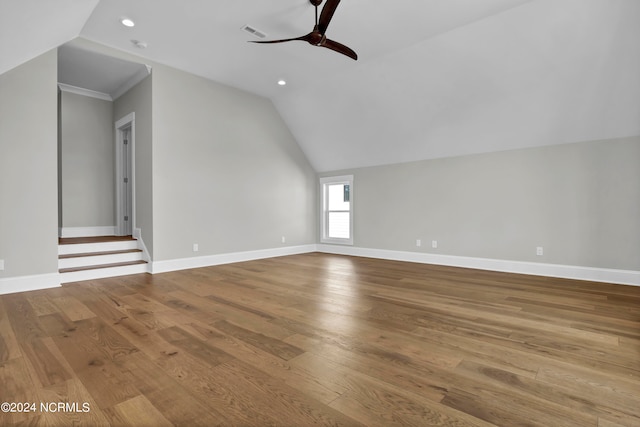 additional living space featuring ceiling fan, wood-type flooring, and lofted ceiling