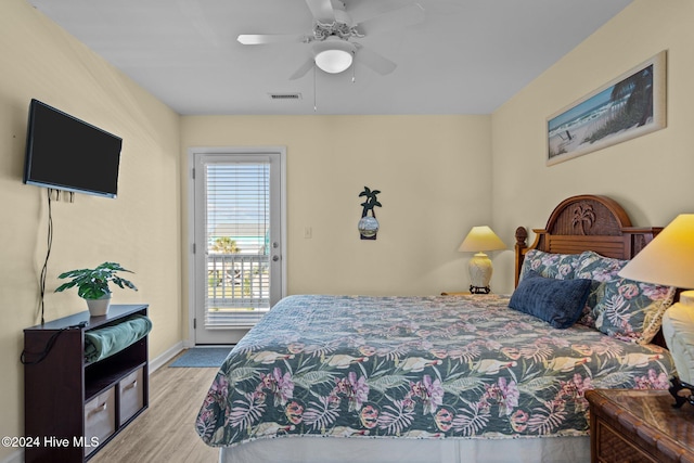 bedroom with ceiling fan, light hardwood / wood-style flooring, and access to exterior