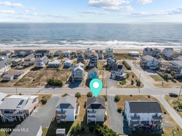 aerial view with a view of the beach and a water view