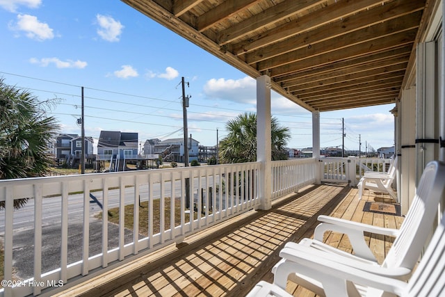 wooden balcony featuring a wooden deck