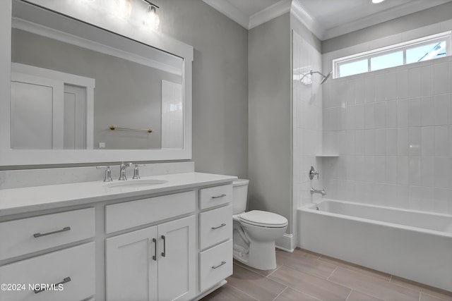 full bathroom featuring toilet, tiled shower / bath combo, vanity, and ornamental molding