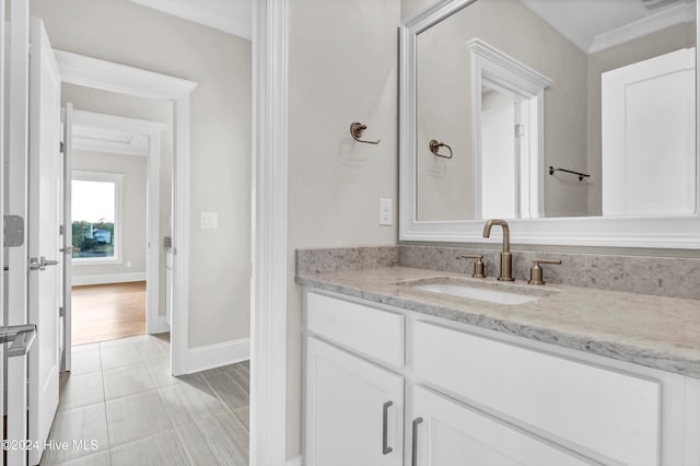 bathroom with vanity and tile patterned flooring