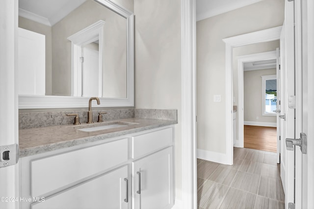 bathroom with vanity and hardwood / wood-style flooring