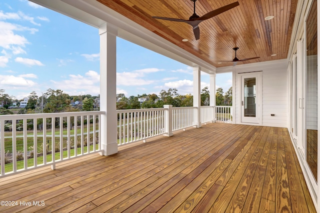 wooden terrace with ceiling fan