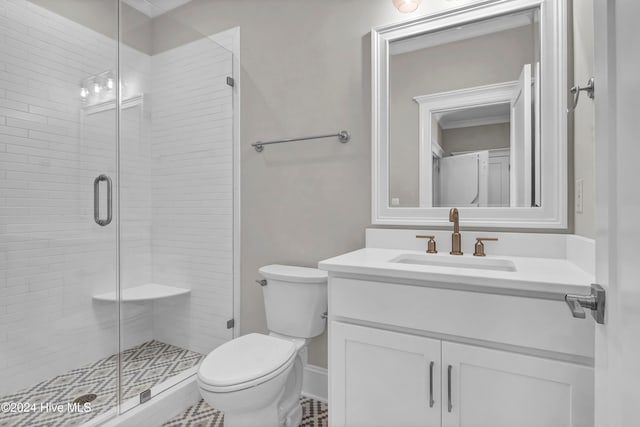 bathroom featuring toilet, walk in shower, and vanity