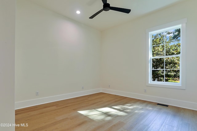 bedroom featuring hardwood / wood-style flooring and ceiling fan