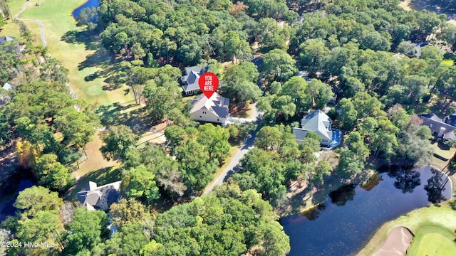 aerial view featuring view of golf course and a water view