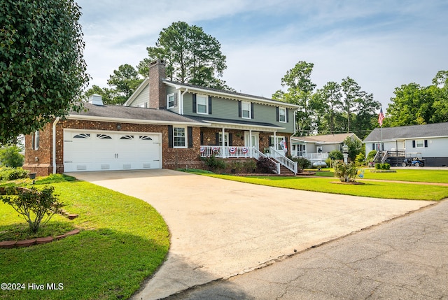 front of property featuring a front yard and a porch