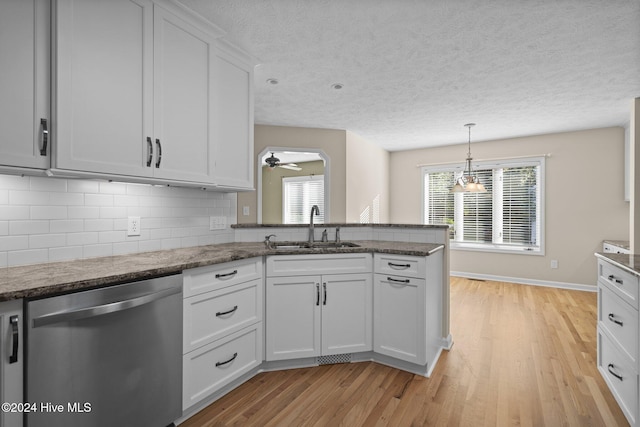 kitchen featuring ceiling fan, white cabinetry, light hardwood / wood-style flooring, dishwasher, and sink