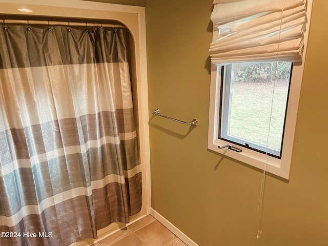 bathroom featuring tile patterned flooring