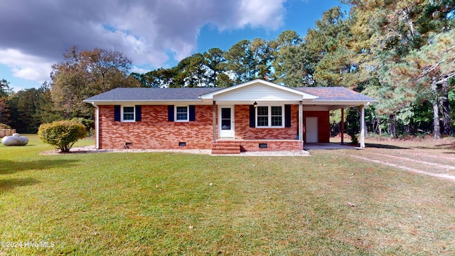 ranch-style house with a front yard and a carport