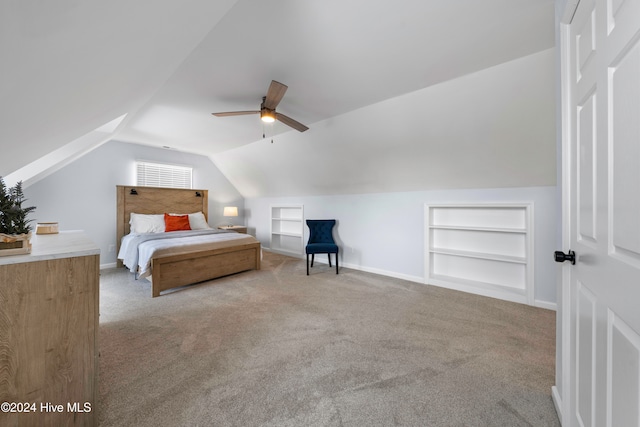 bedroom featuring carpet, vaulted ceiling, and ceiling fan