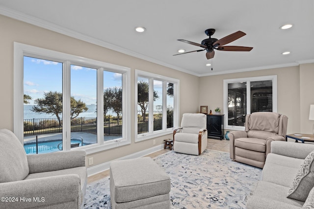 living room with a ceiling fan, baseboards, crown molding, and recessed lighting