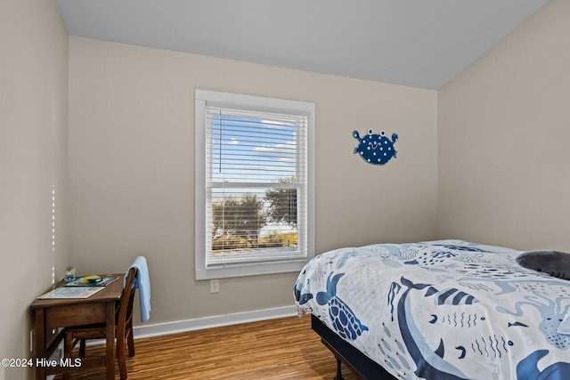 bedroom featuring hardwood / wood-style flooring