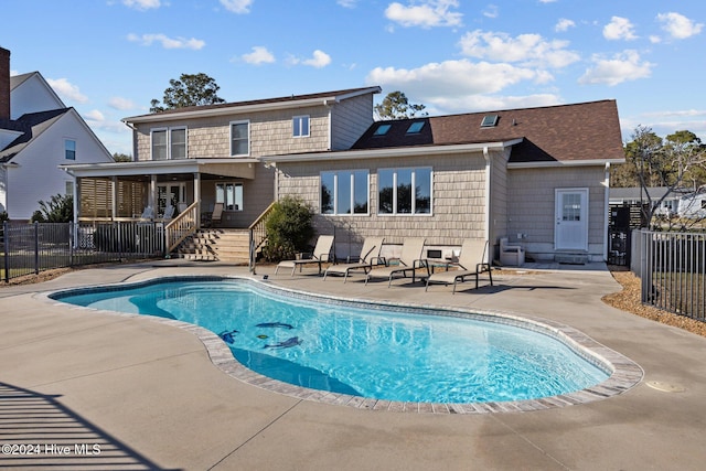 view of swimming pool featuring a patio