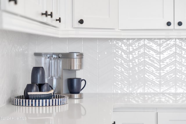 details featuring white cabinetry