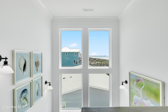 room details with visible vents and crown molding