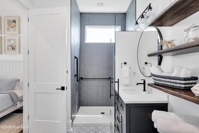 full bathroom with tiled shower, ensuite bath, and vanity