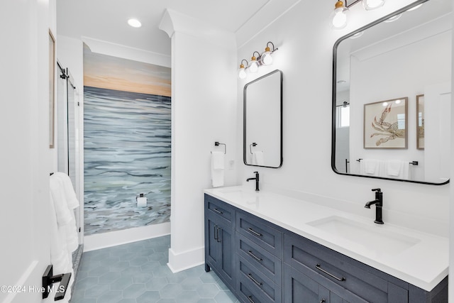 full bath featuring tile patterned flooring, double vanity, walk in shower, and a sink