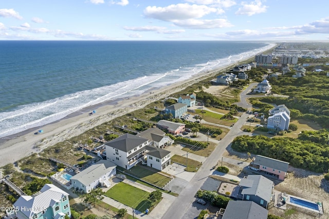 aerial view with a view of the beach and a water view