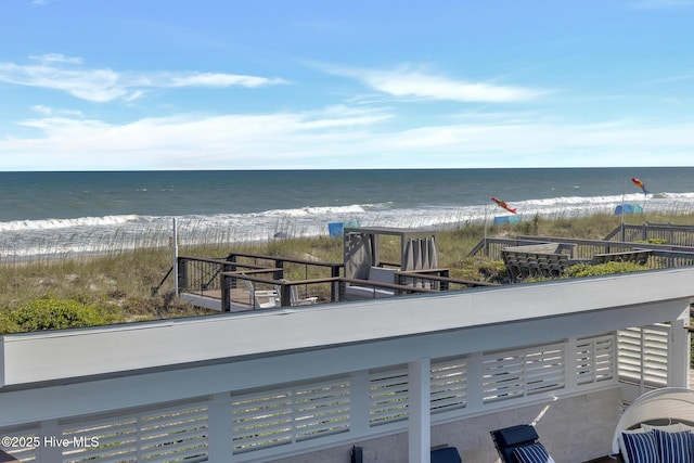 property view of water with a beach view