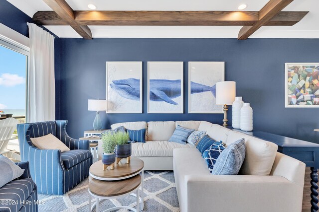 living area with beamed ceiling and coffered ceiling