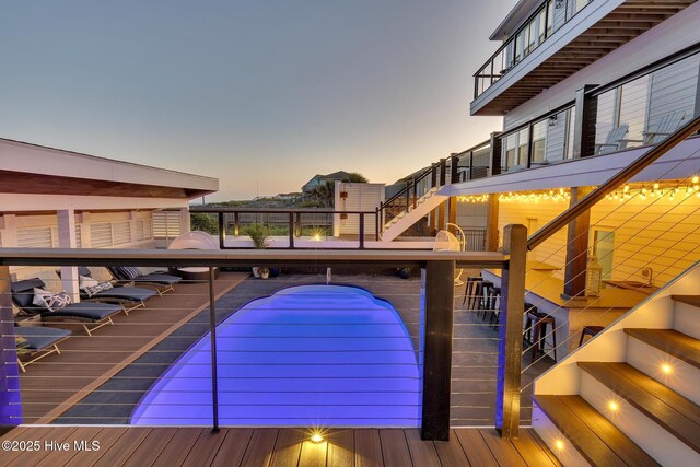 view of deck at dusk