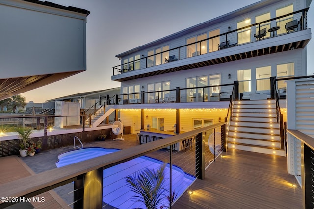 interior space featuring stairway and outdoor dining area