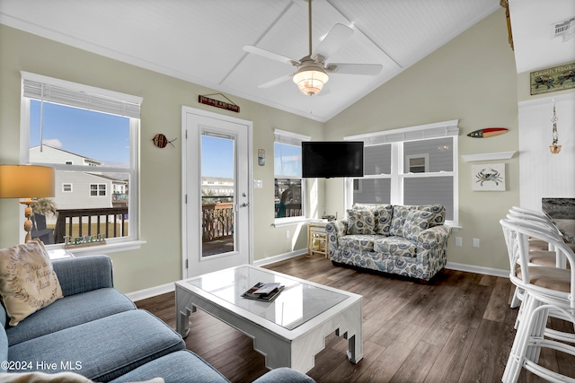 living room featuring lofted ceiling, dark wood-type flooring, and ceiling fan