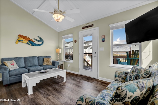 living room with ceiling fan, vaulted ceiling, dark hardwood / wood-style floors, and a healthy amount of sunlight