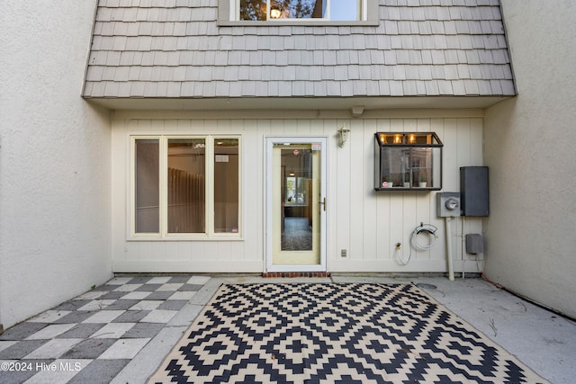 entrance to property with a patio area