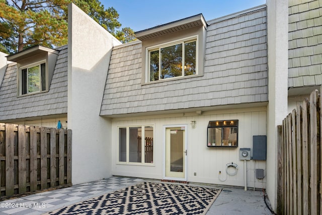 rear view of property with a patio