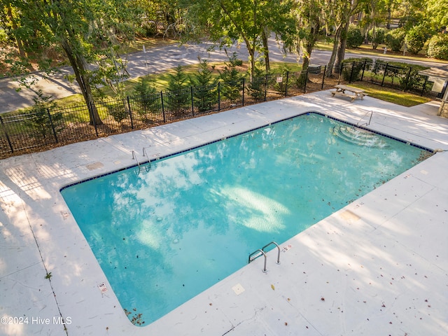 view of pool with a patio area